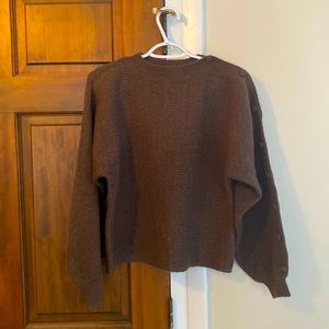 Button sleeve sweater